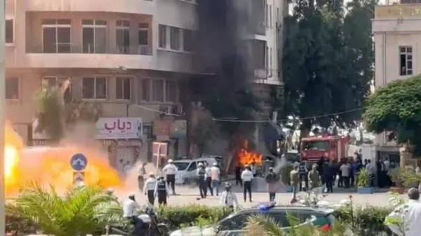 دمشق إصابات في تفجيرات متزامنة مع استقبال الرئيس الفرنسي