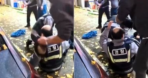 مطاردة شرطى آسيوى لرجل ثمل تتحول إلى مشهد كوميدى مطاردة شرطى آسيوى لرجل ثمل تتحول إلى مشهد كوميدى