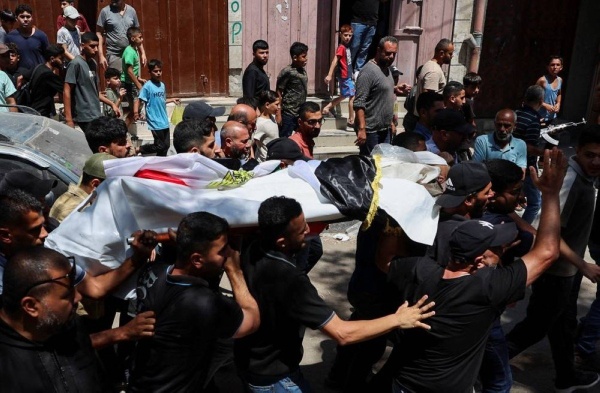 سكان غزة ينعون مسؤول إغاثة عرض مباريات بكأس العالم بعد قتله في غارة إسرائيلية سكان غزة ينعون مسؤول إغاثة عرض مباريات بكأس العالم بعد قتله في غارة إسرائيلية