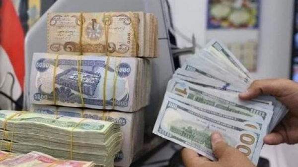 صدمة الدولار شلل يصيب أسواق العراق عقب خفض الحكومة قيمة الدينار صدمة الدولار شلل يصيب أسواق العراق عقب خفض الحكومة قيمة الدينار