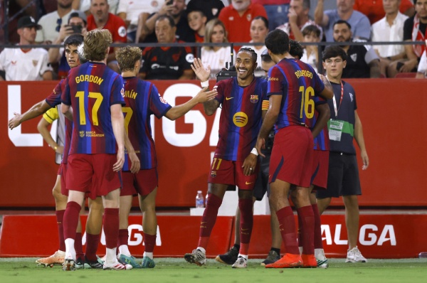 برشلونة يفوز على إشبيلية في الدوري الإسباني برشلونة يفوز على إشبيلية في الدوري الإسباني