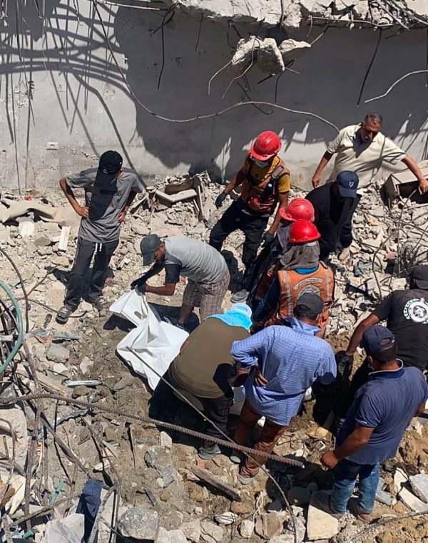 retrieving the bodies of 55 martyrs in the zaytoun neighborhood