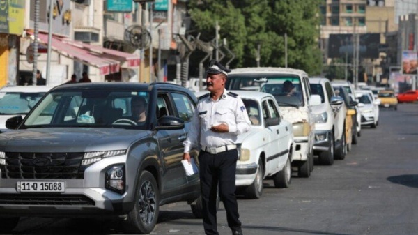 طوابير البنزين تضرب شوارع العراق مع تراجع الإمدادات عبر مضيق هرمز