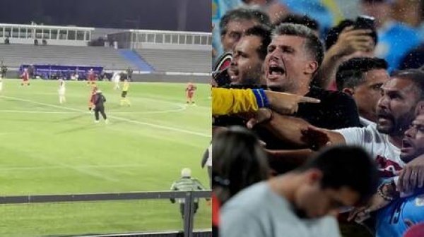 مشهد صادم في أوروغواي جماهير تقتحم الملعب وتعتدي على لاعبي فريقها والحارس يتدخل للدفاع مشهد صادم في أوروغواي جماهير تقتحم الملعب وتعتدي على لاعبي فريقها والحارس يتدخل للدفاع