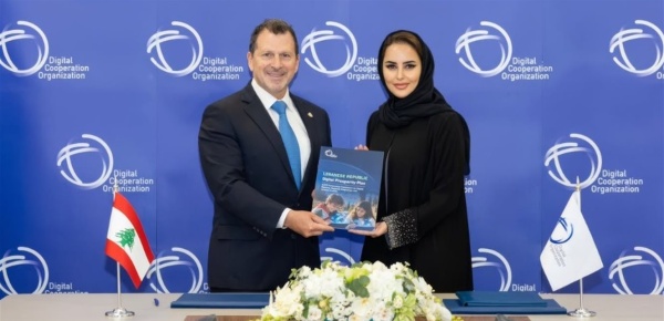 شحادة وقع ميثاق منظمة التعاون الرقمي وسلمه رسميا إلى أمينتها العامة