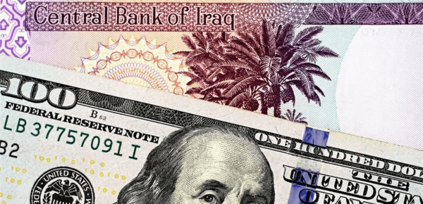 البنك المركزي العراقي يعتمد سعر صرف جديد للدينار مقابل الدولار