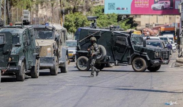 العدوان على قلنديا 16 مصابا وهدم واعتقالات وتخريب للممتلكات العدوان على قلنديا 16 مصابا وهدم واعتقالات وتخريب للممتلكات
