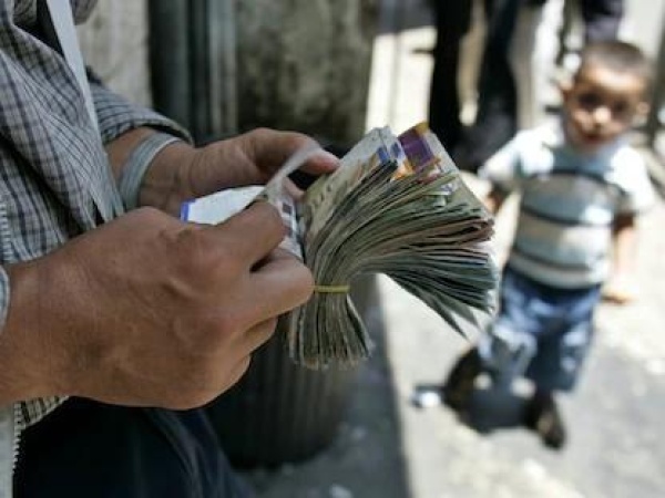 خاص الاقتصاد الفلسطيني تحت وطأة الانكماش والركود التضخمي أزمة تتفاقم