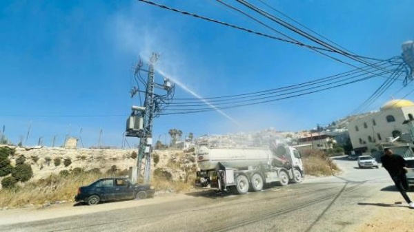 استعدادا للشتاء كهرباء القدس تغسل شبكاتها وتحص نها لمواجهة الأعطال صور