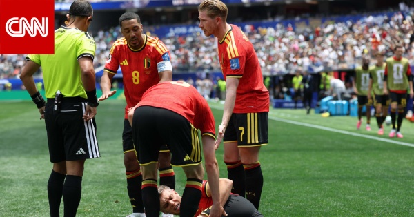 لقطة مونديالية أطباء يتراجعون عن إسعاف لاعب بلجيكا داخل الملعب لهذا السبب لقطة مونديالية أطباء يتراجعون عن إسعاف لاعب بلجيكا داخل الملعب لهذا السبب