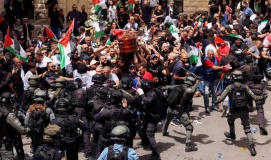 beating of palestinian mourners recalls apartheid tutu foundation