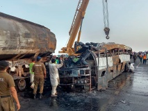 at least 20 killed in pakistan as bus tanker crash causes fire