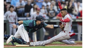 angels edge mariners in 10 innings after bullpen meltdown in 9th
