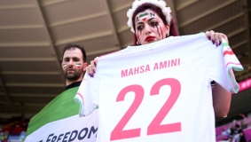 iran government supporters confront protesters at world cup