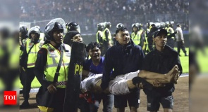 at least 127 dead after riot at indonesia football match