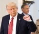 trump threatens russia with crushing sanctions