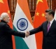 china india relations have made positive progress chinese foreign minister