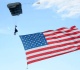 american flag skydiver crashes into beer tent video