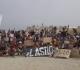 watch hundreds of migrants demand asylum in spanish enclave
