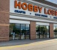 hobby lobby is selling a stylish accent cabinet that adds farmhouse charm to any space