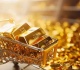 الذهب يتراجع مع صعود الدولار وتقلص رهانات خفض الفائدة الأميركية