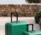 quince s new seasonal carry on is the perfect pop of color for your summer travel capsule