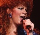 reba mcentire s heartbreaking 1991 country anthem tells a rags to riches story with a twist