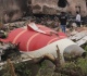 investigators search air india crash site as modi meets lone survivor