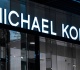 michael kors outlet s elegant crossbody purse has beautiful floral details that elevate summer outfits