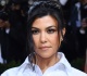 kourtney kardashian sizzles in red bikini for long weekend