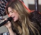kelly clarkson turns heads with slim figure in skintight catsuit on today