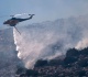 greece battles wildfire near capital as summer s first heatwave hits