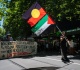 police probe explosive device thrown at indigenous protest in australia