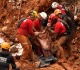 brazil flooding death toll rises to 64 as search efforts continue