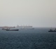 oil prices climb after attack in strait of hormuz halts evacuation plan