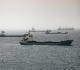 iran says seven ships hit in hormuz strait warns us of wider response