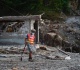 nepal and china resume flood rescue as death toll nears 600