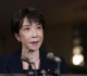 japanese delegation seeks to soothe strained ties with china