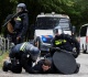 dutch riot police break up violent far right protest in the hague