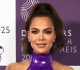 fans in awe of khloe kardashian s toned arms in skintight sleeveless purple dress