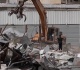 israel bulldozes palestinian shops to make way for settlement linked road