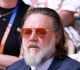russell crowe snaps at fans outside paris hotel during awkward autograph encounter