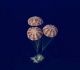 moment artemis ii splashes down after moon mission