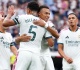 real madrid cruise past malaga 4 0 to maintain mourinho s perfect start
