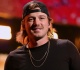 watch morgan wallen bring out surprise guest for sizzling duet during night one at c randall stadium