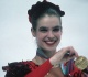 1988 olympic skater chose a daring red costume for her final routine creating figure skating history