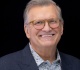 undercover boss returning to cbs drew carey hosting reimagined version of the show