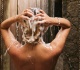 here s what happens to your body when you don t wash your hair