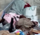israeli soldiers throw belongings from besieged palestinian home