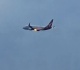 flames burst from qantas plane engine after new zealand takeoff
